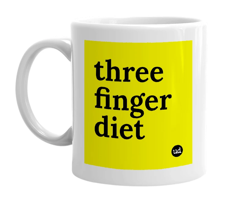 White mug with 'three finger diet' in bold black letters