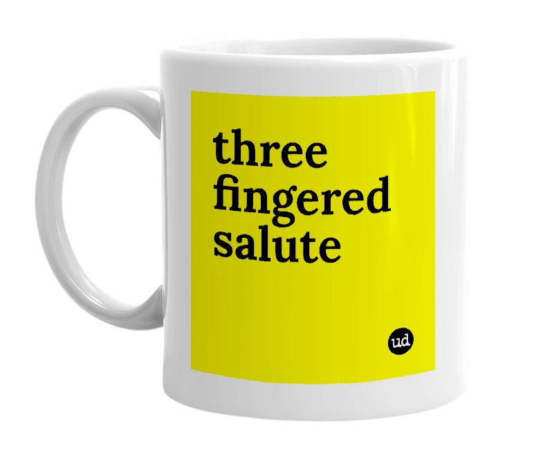 White mug with 'three fingered salute' in bold black letters