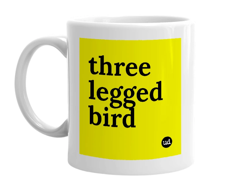 White mug with 'three legged bird' in bold black letters