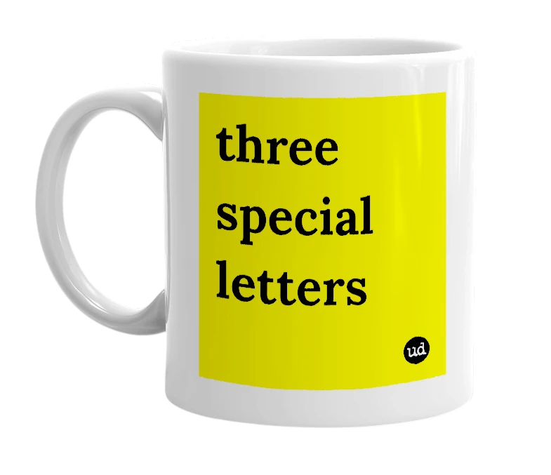 White mug with 'three special letters' in bold black letters