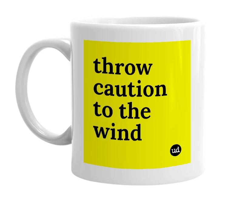 White mug with 'throw caution to the wind' in bold black letters