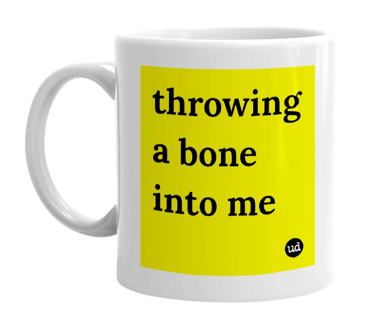 White mug with 'throwing a bone into me' in bold black letters