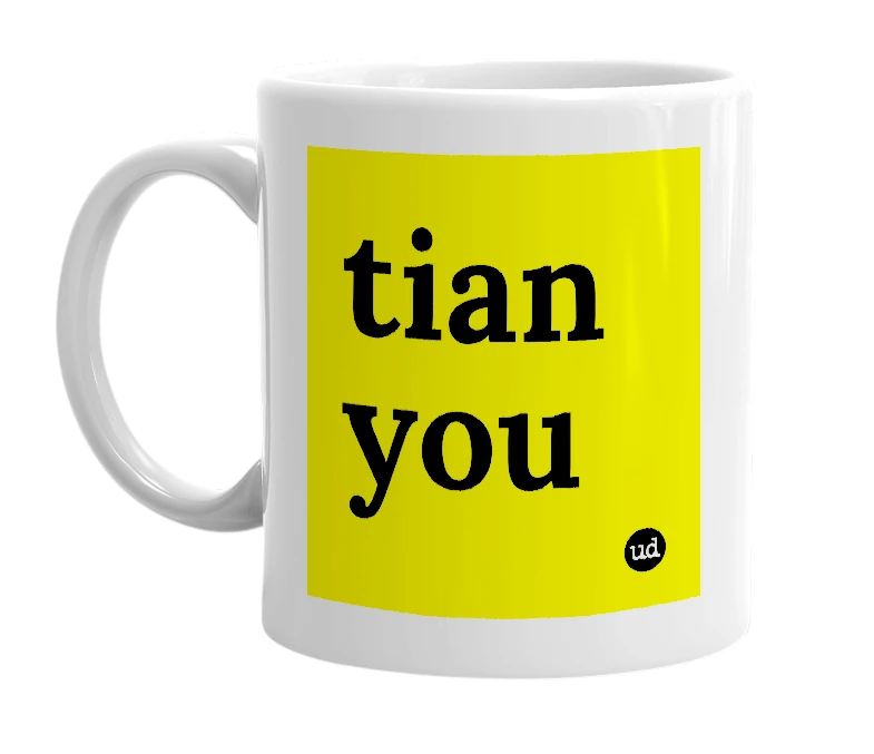 White mug with 'tian you' in bold black letters