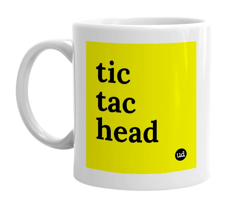 White mug with 'tic tac head' in bold black letters