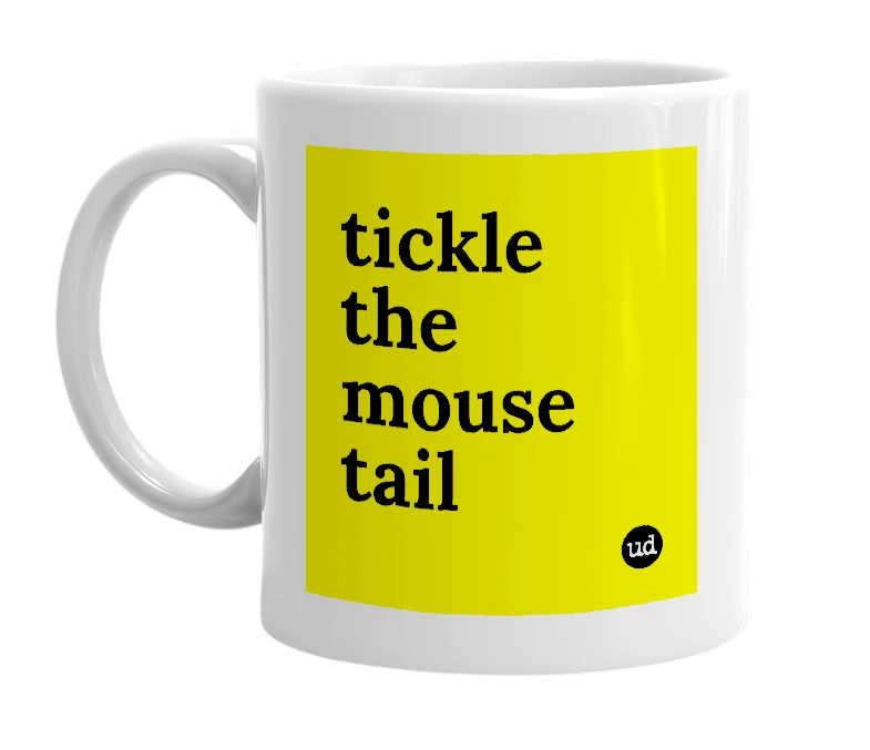 White mug with 'tickle the mouse tail' in bold black letters