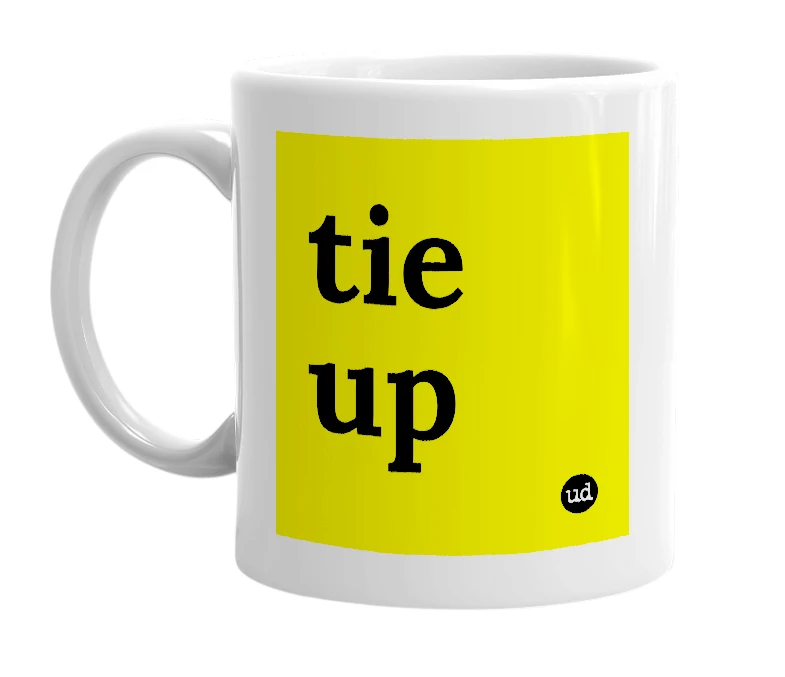 White mug with 'tie up' in bold black letters