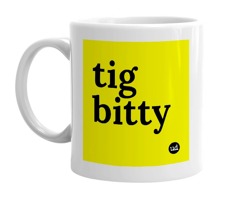 White mug with 'tig bitty' in bold black letters