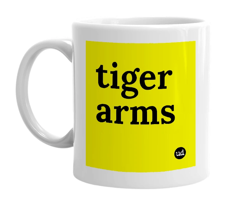 White mug with 'tiger arms' in bold black letters