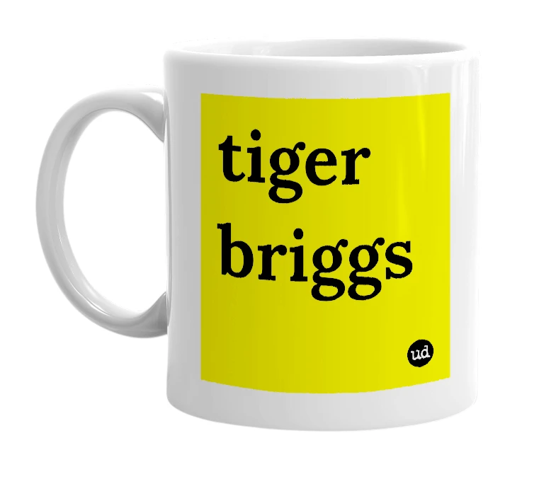 White mug with 'tiger briggs' in bold black letters