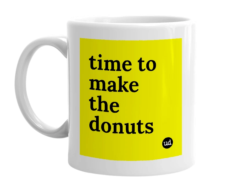 White mug with 'time to make the donuts' in bold black letters