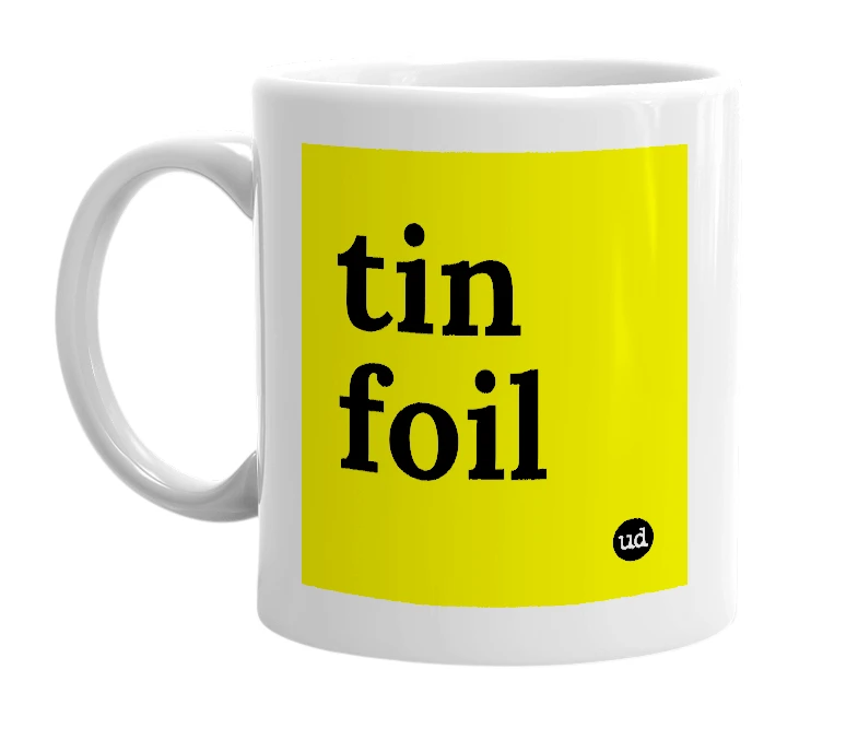 White mug with 'tin foil' in bold black letters