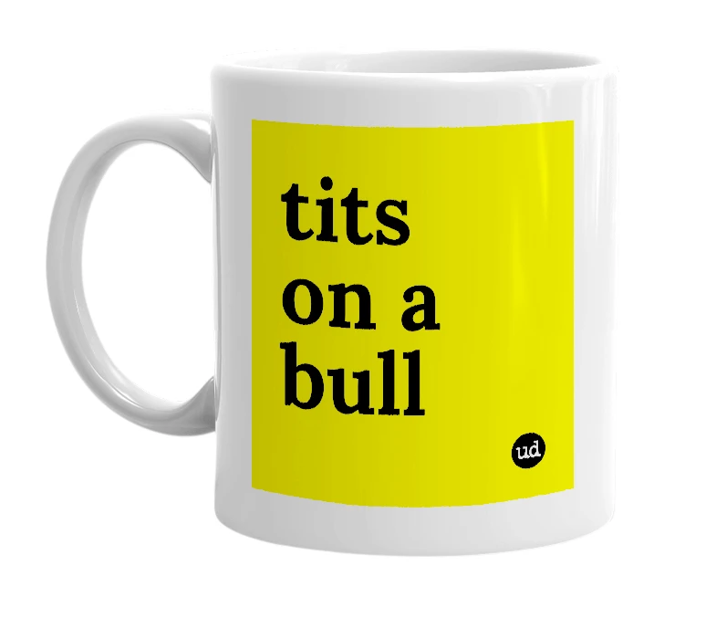 White mug with 'tits on a bull' in bold black letters