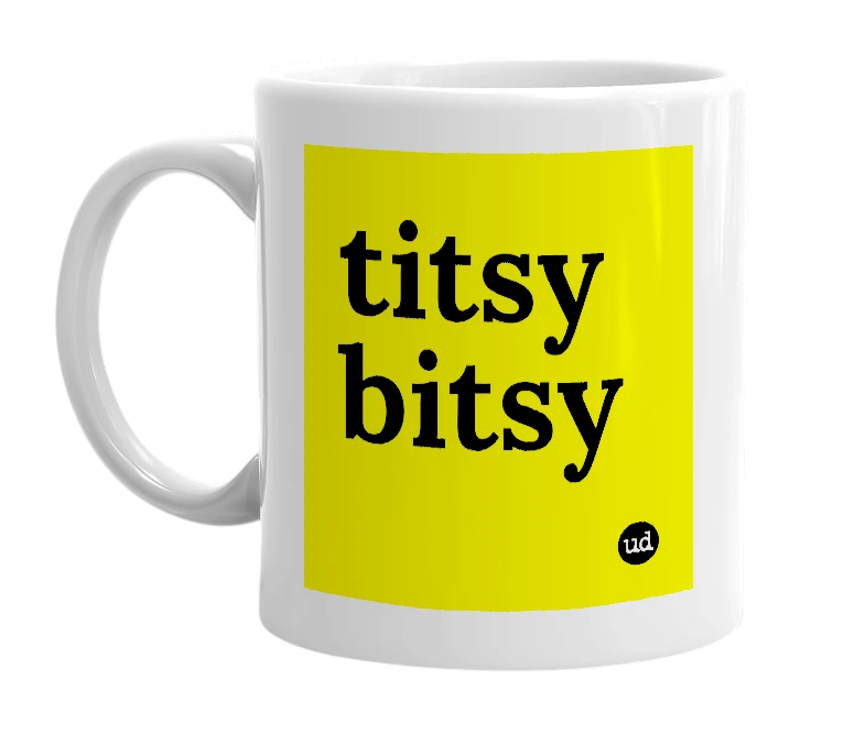 White mug with 'titsy bitsy' in bold black letters