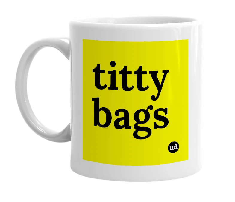 White mug with 'titty bags' in bold black letters