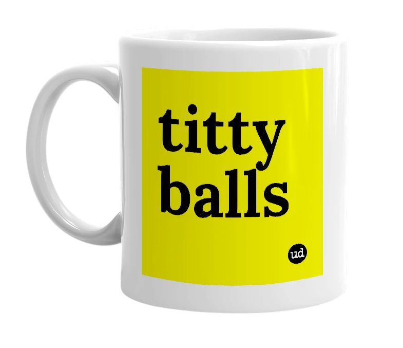 White mug with 'titty balls' in bold black letters
