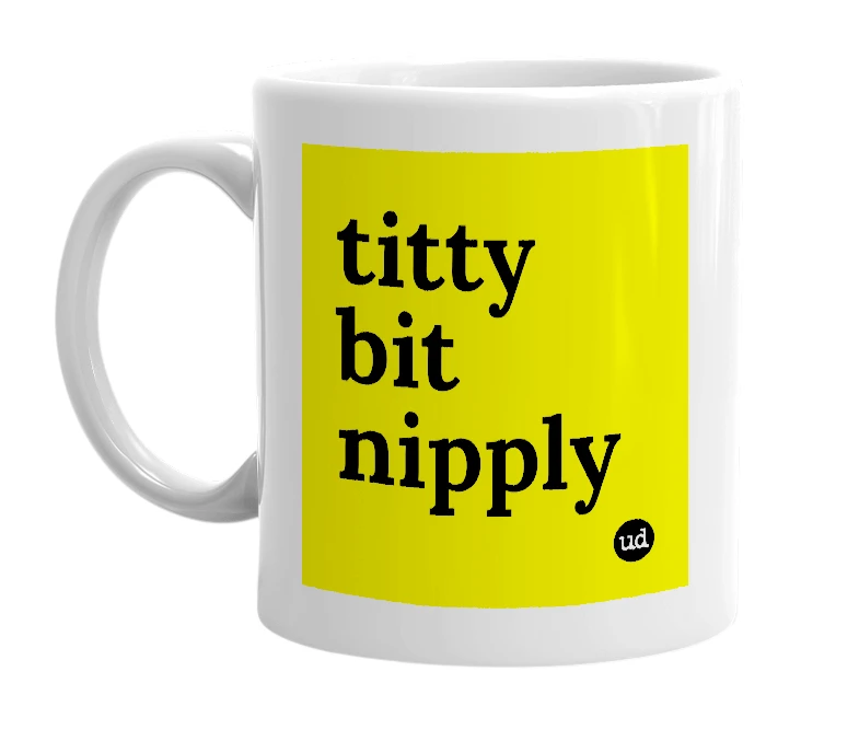 White mug with 'titty bit nipply' in bold black letters