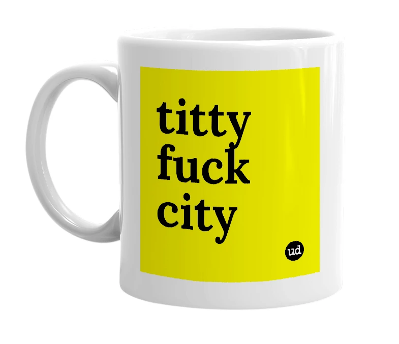 White mug with 'titty fuck city' in bold black letters