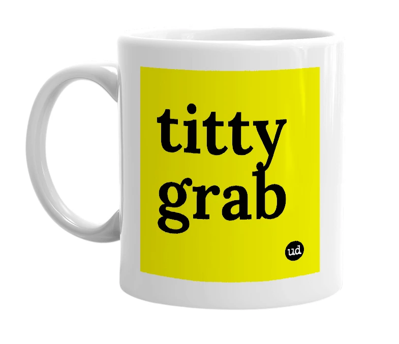 White mug with 'titty grab' in bold black letters