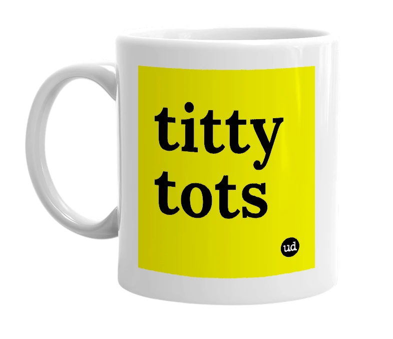 White mug with 'titty tots' in bold black letters