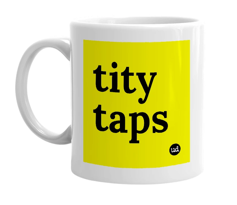 White mug with 'tity taps' in bold black letters