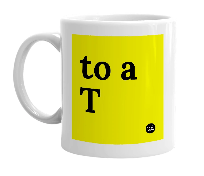 White mug with 'to a T' in bold black letters