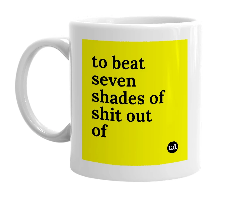 White mug with 'to beat seven shades of shit out of' in bold black letters