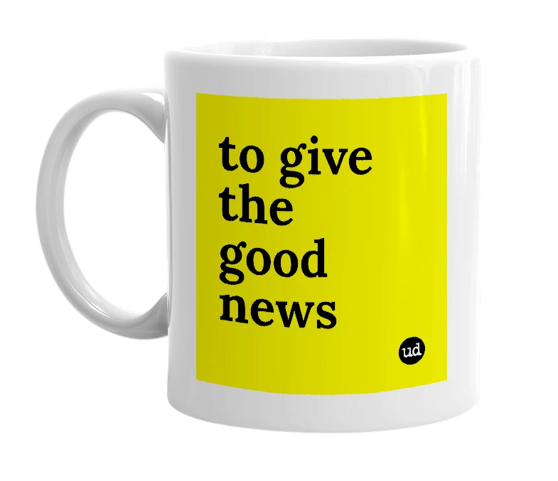 White mug with 'to give the good news' in bold black letters