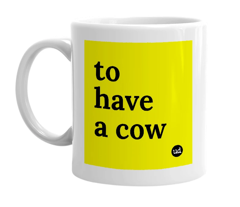 White mug with 'to have a cow' in bold black letters