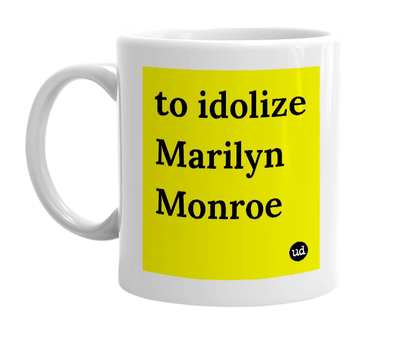 White mug with 'to idolize Marilyn Monroe' in bold black letters