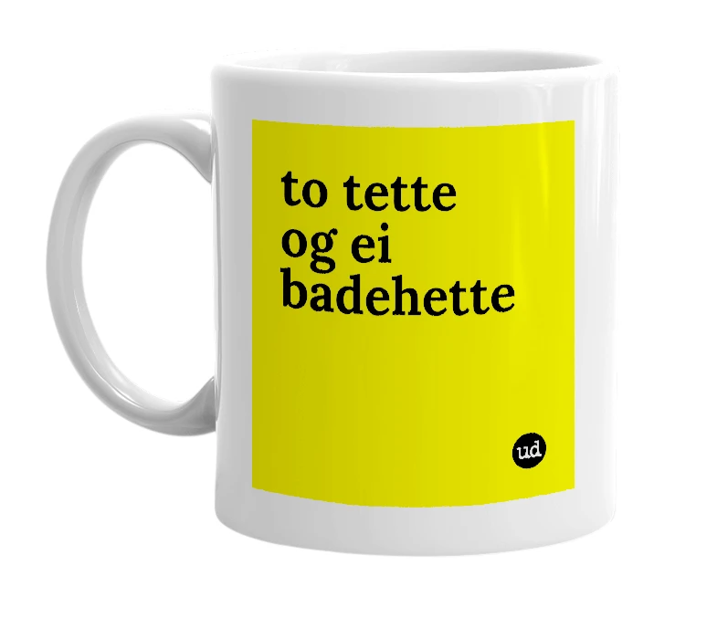 White mug with 'to tette og ei badehette' in bold black letters