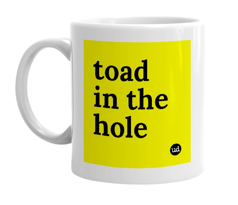 White mug with 'toad in the hole' in bold black letters