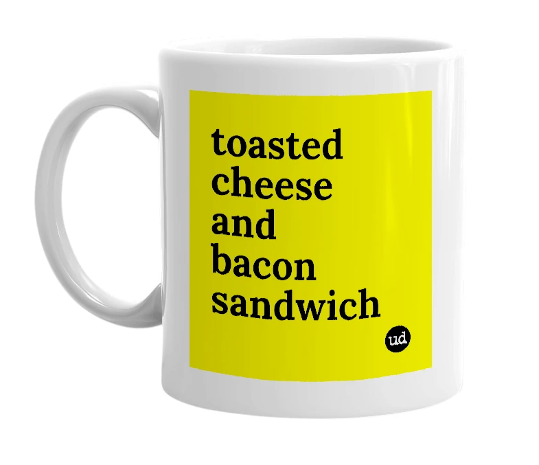 White mug with 'toasted cheese and bacon sandwich' in bold black letters