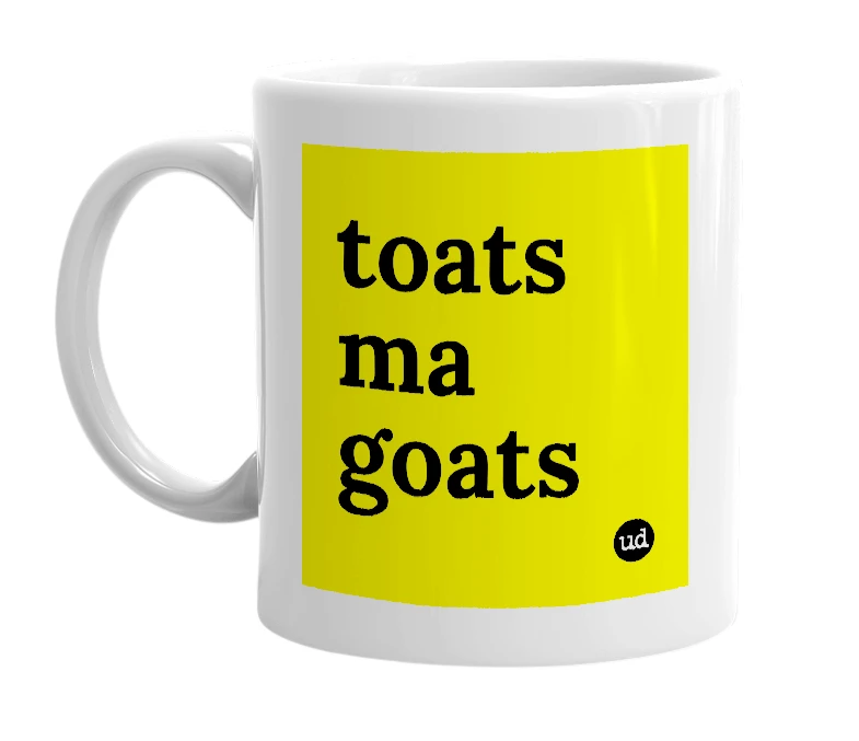 White mug with 'toats ma goats' in bold black letters