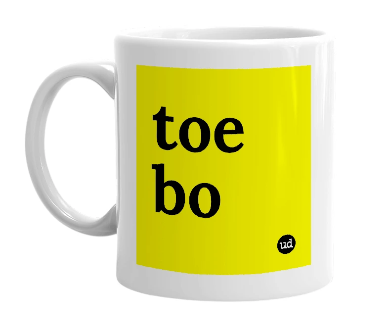 White mug with 'toe bo' in bold black letters