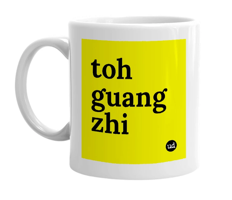 White mug with 'toh guang zhi' in bold black letters