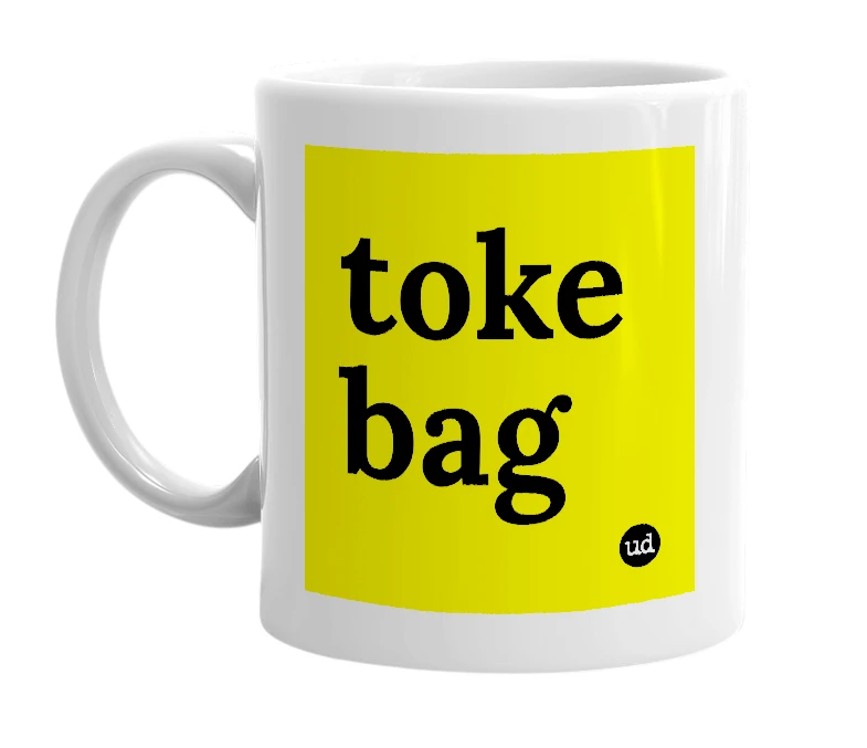 White mug with 'toke bag' in bold black letters