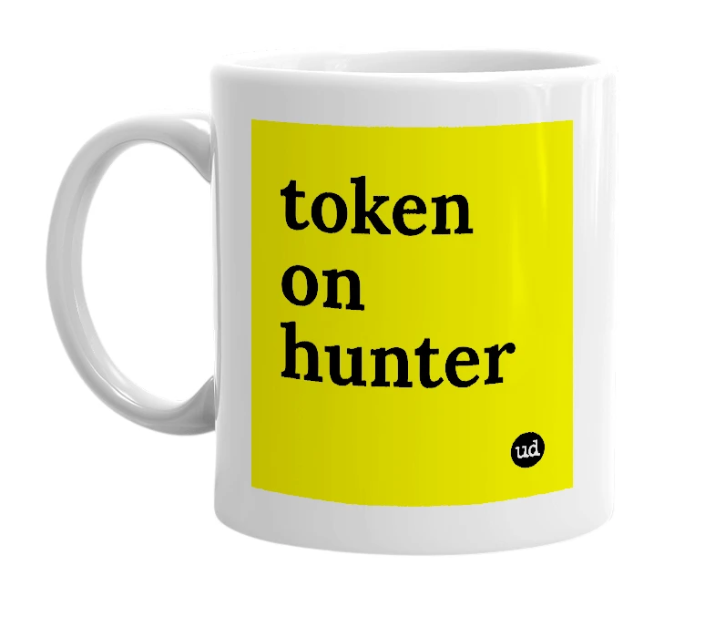 White mug with 'token on hunter' in bold black letters