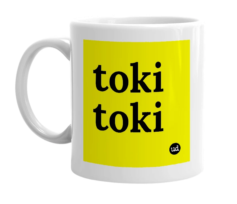 White mug with 'toki toki' in bold black letters