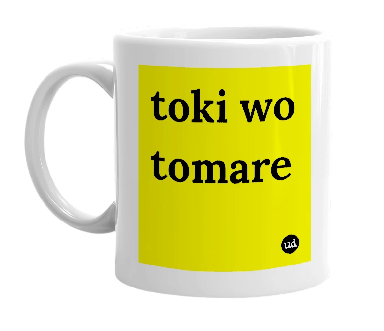 White mug with 'toki wo tomare' in bold black letters