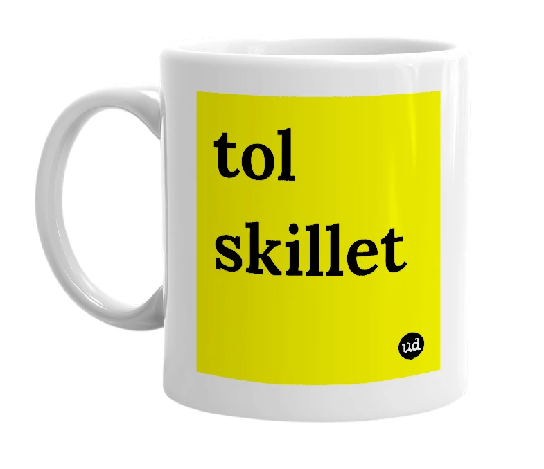 White mug with 'tol skillet' in bold black letters