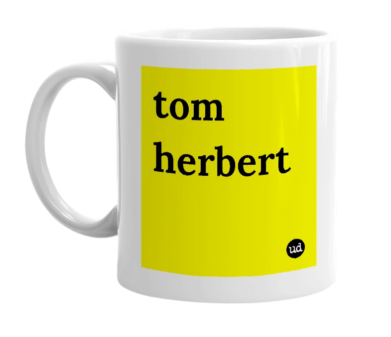 White mug with 'tom herbert' in bold black letters
