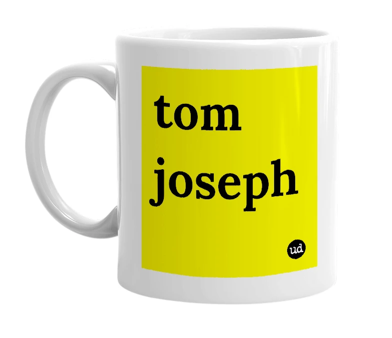 White mug with 'tom joseph' in bold black letters