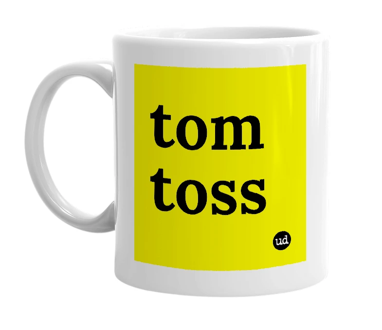 White mug with 'tom toss' in bold black letters