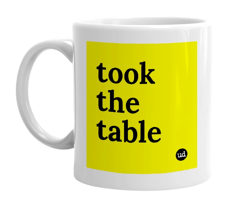 White mug with 'took the table' in bold black letters