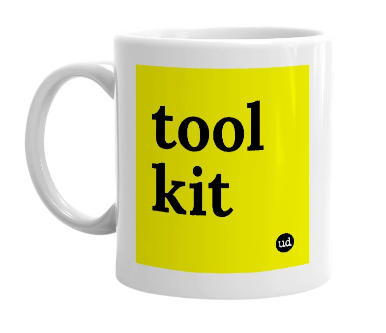 White mug with 'tool kit' in bold black letters