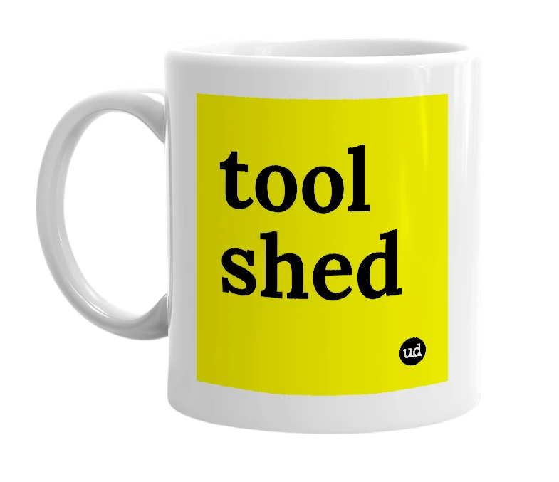 White mug with 'tool shed' in bold black letters