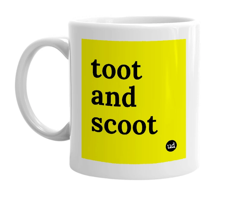 White mug with 'toot and scoot' in bold black letters