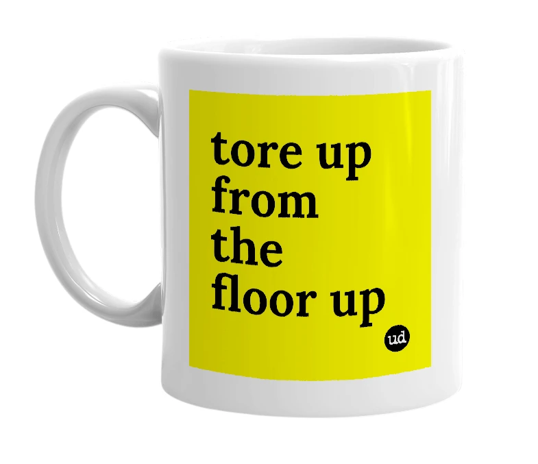 White mug with 'tore up from the floor up' in bold black letters