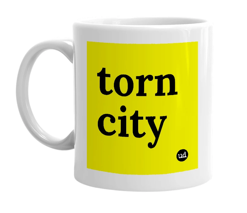 White mug with 'torn city' in bold black letters