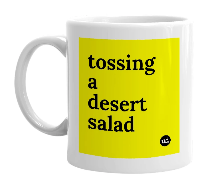 White mug with 'tossing a desert salad' in bold black letters